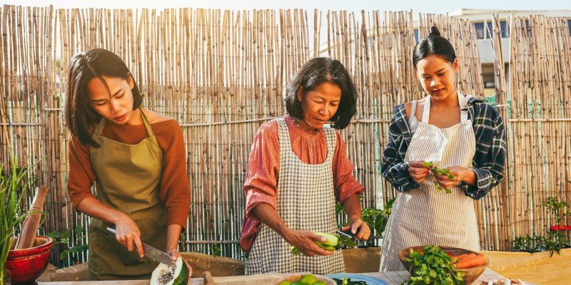 asian-family-cooking-together-at-home-patio-outdoo-2026-01-11-08-11-17-utc